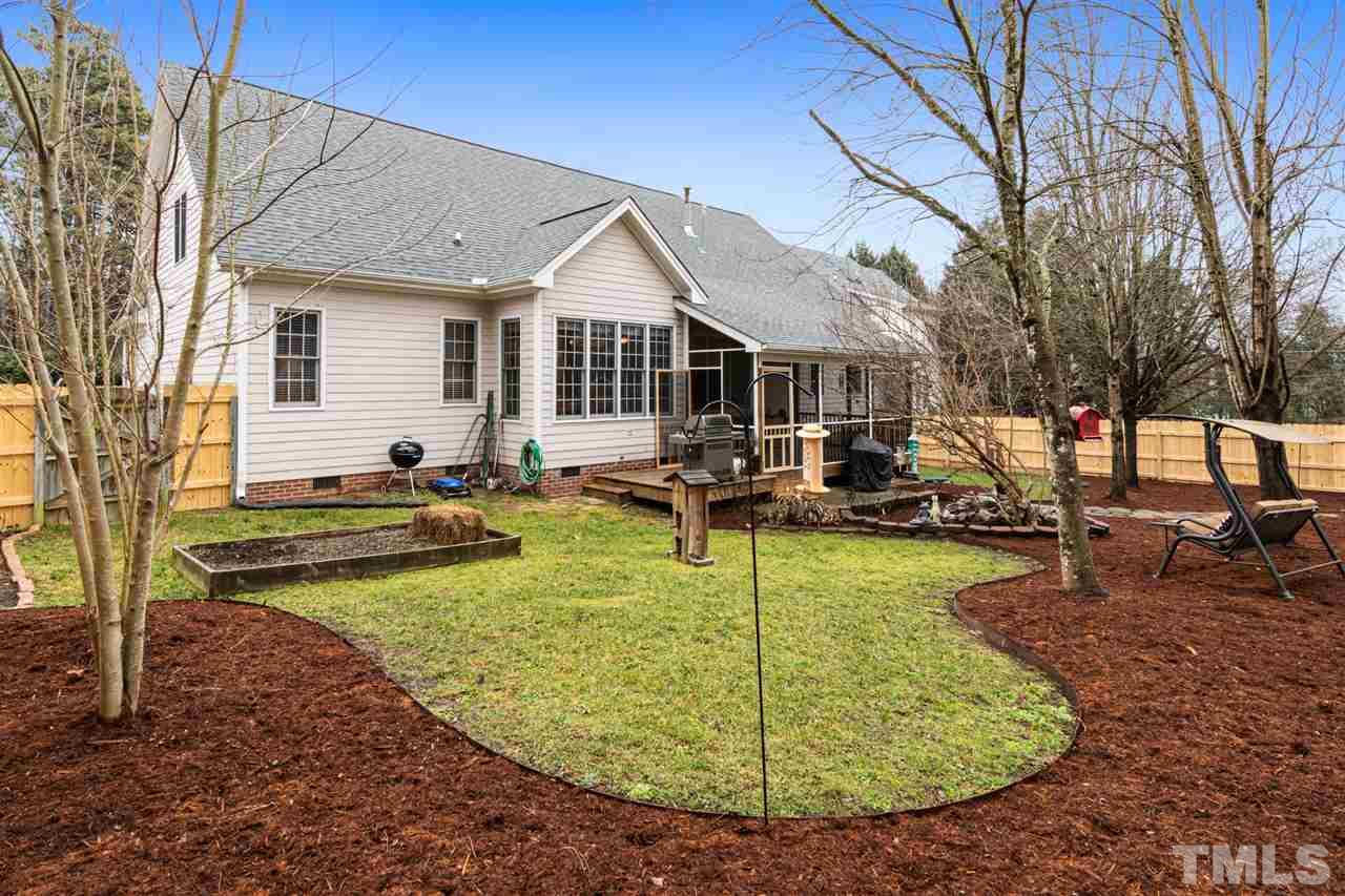 2408 Carruthers Court Raleigh, NC 27615 - Photo 27 of 30 a view of a house with swimming pool