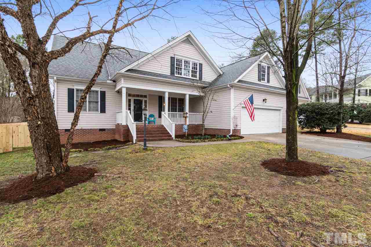2408 Carruthers Court Raleigh, NC 27615 - Photo 28 of 30 a front view of a house with garden