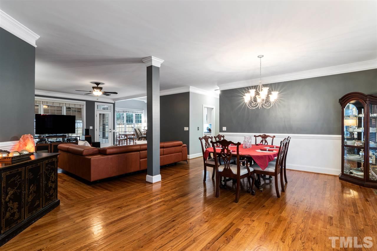 2408 Carruthers Court Raleigh, NC 27615 - Photo 4 of 30 a view of a dining room with furniture window and wooden floor