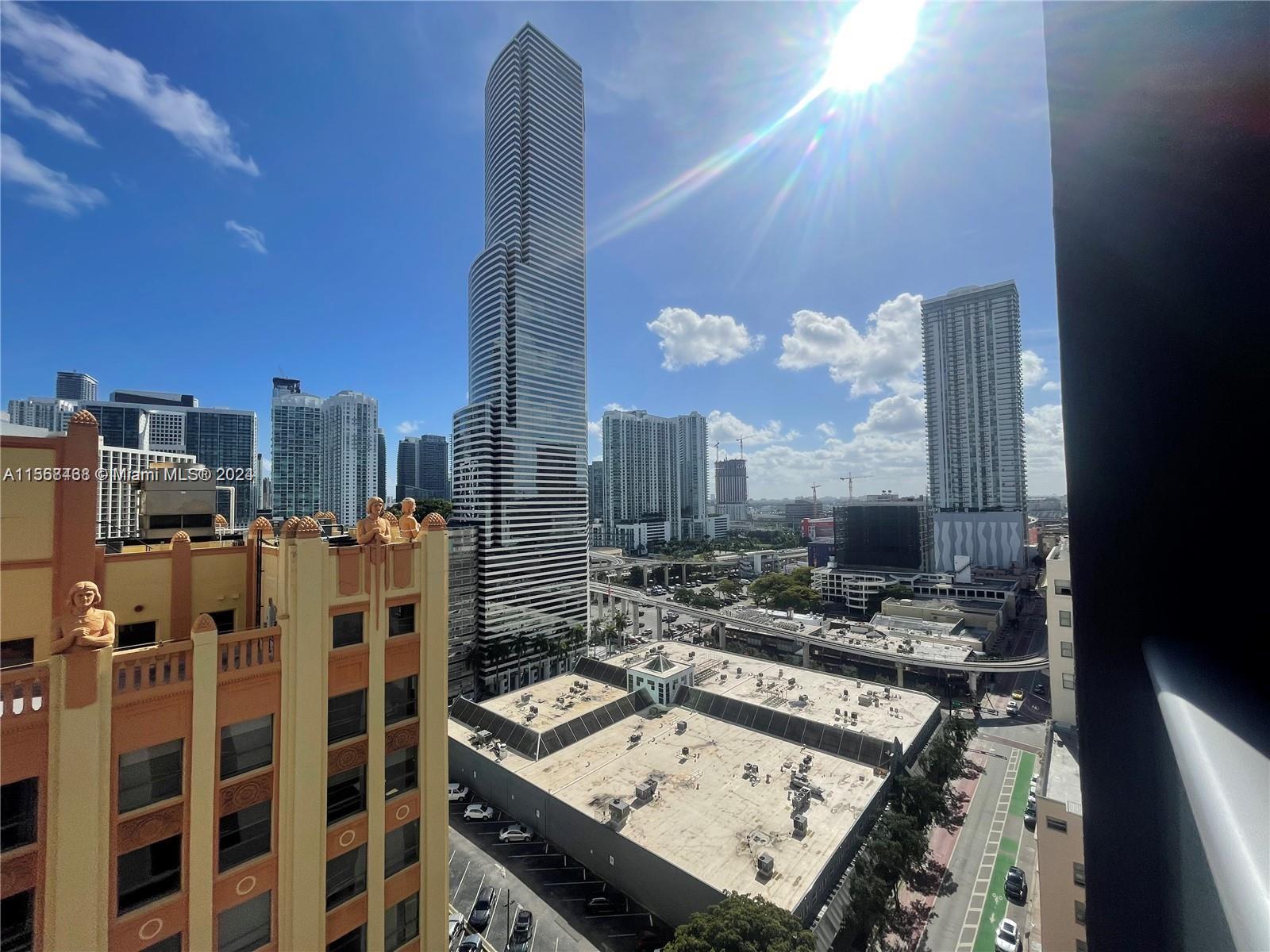 151 Southeast 1st Street, Unit 1505 Miami, FL 33131 - Photo 23 of 23 a view of a city with tall buildings