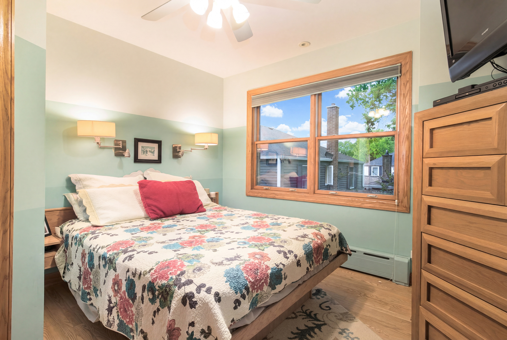 1605 South Fairview Avenue Park Ridge, IL 60068 - Photo 17 of 31 a large bed sitting in a bedroom next to a window