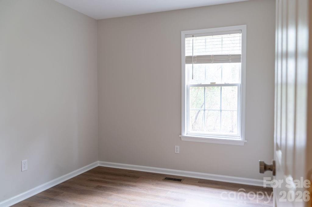 226 B Brookwood Road Belmont, NC 28012 - Photo 16 of 29 an empty room with a window