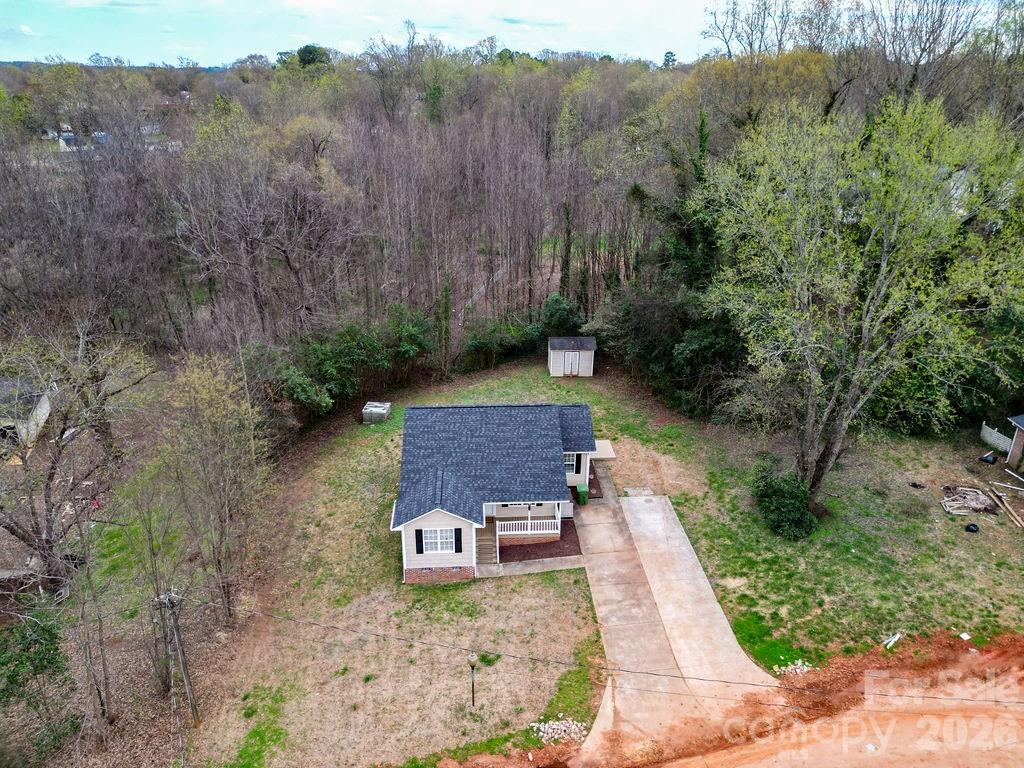 226 B Brookwood Road Belmont, NC 28012 - Photo 2 of 29 a view of a pathway with a yard