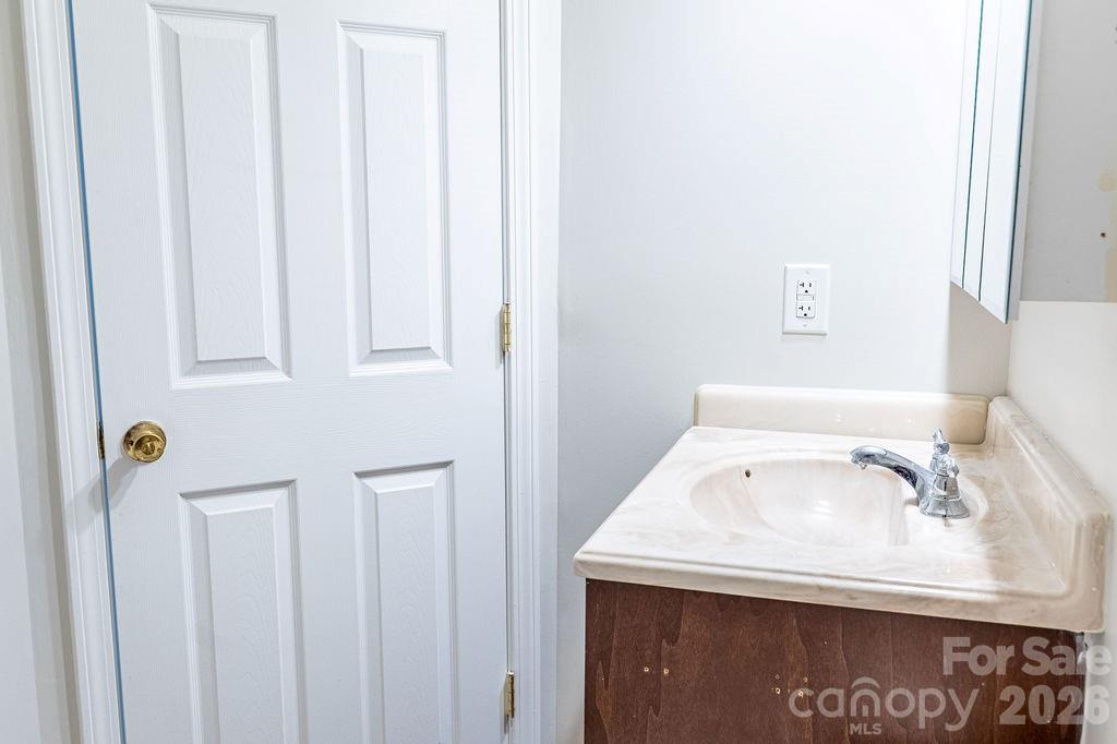 226 B Brookwood Road Belmont, NC 28012 - Photo 21 of 29 a bathroom with a sink and a window