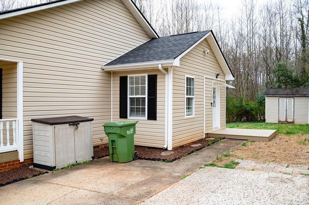 226 B Brookwood Road Belmont, NC 28012 - Photo 24 of 29 a front view of a house with garden