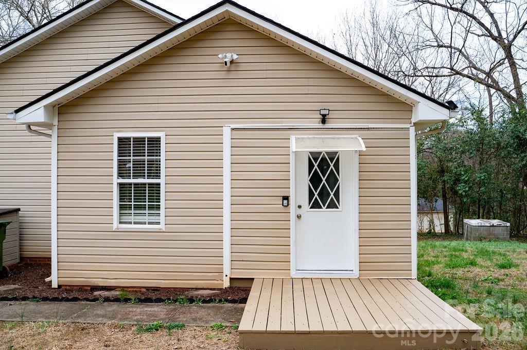 226 B Brookwood Road Belmont, NC 28012 - Photo 25 of 29 a front view of a house with a yard