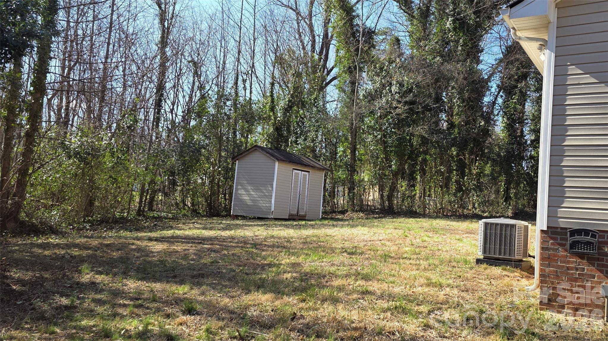 226 B Brookwood Road Belmont, NC 28012 - Photo 28 of 29 a view of a house with a yard