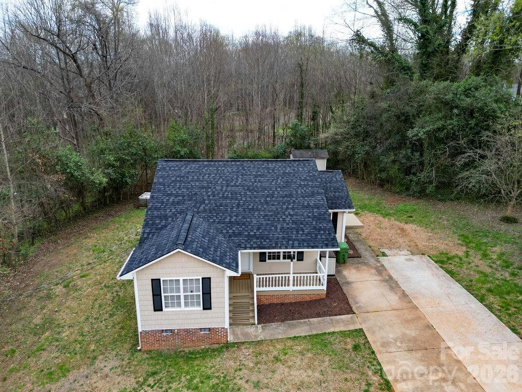 226 B Brookwood Road Belmont, NC 28012 - Photo 4 of 29 a aerial view of a house with a yard