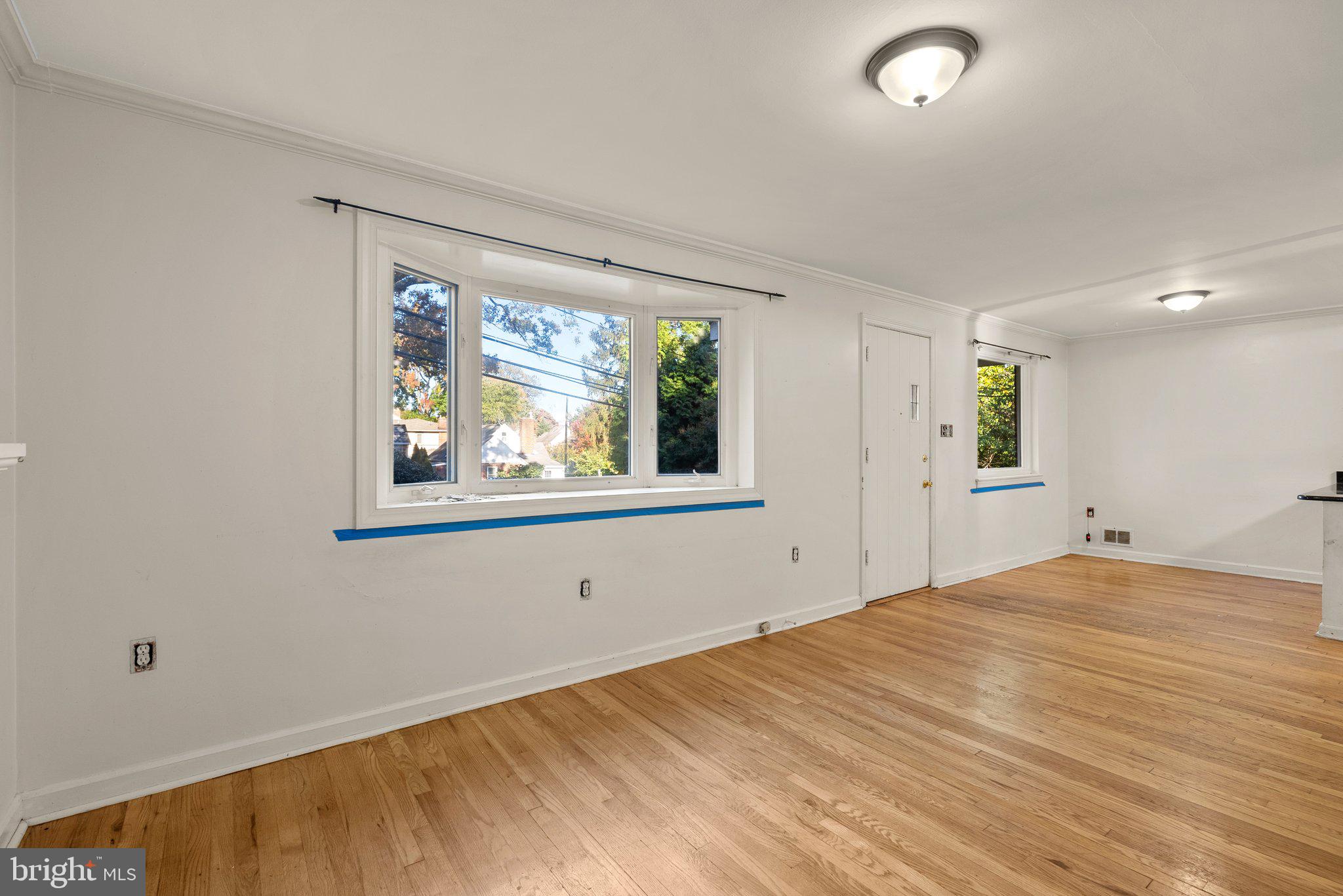 502 Lanark Way Silver Spring, MD 20901 - Photo 3 of 29 a view of an empty room with a window
