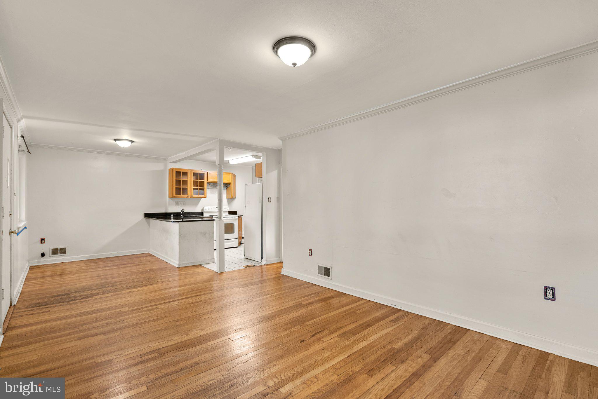 502 Lanark Way Silver Spring, MD 20901 - Photo 5 of 29 a view of a kitchen with wooden floor