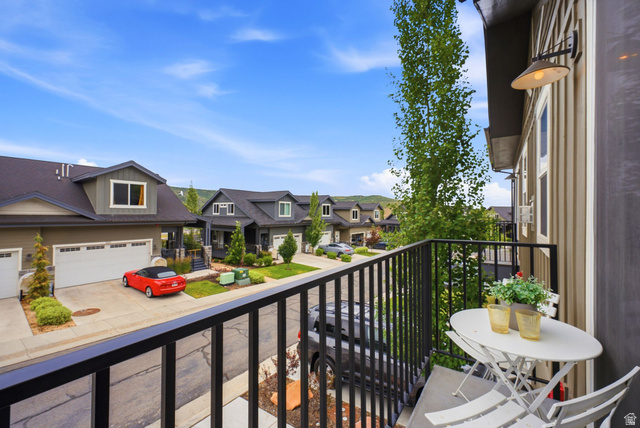 3355 Santa Fe Road Park City, UT 84098 - Photo 28 of 45 Private balcony featuring a black metal railing and exterior wall sconce