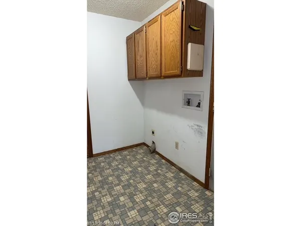 a picture of a bench in a white wall