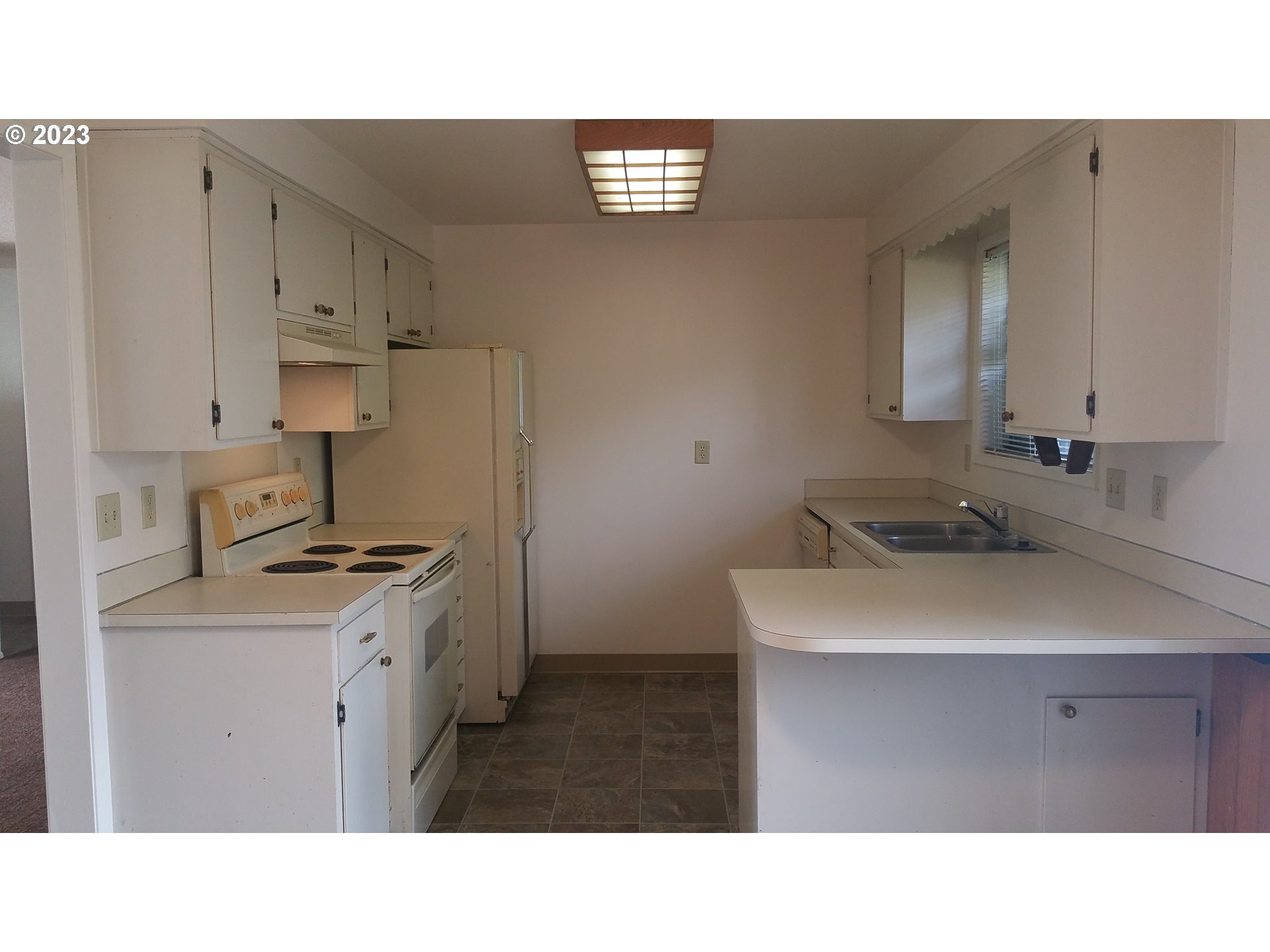 806 V Street Springfield, OR 97477 - Photo 13 of 14 a kitchen view and a sink