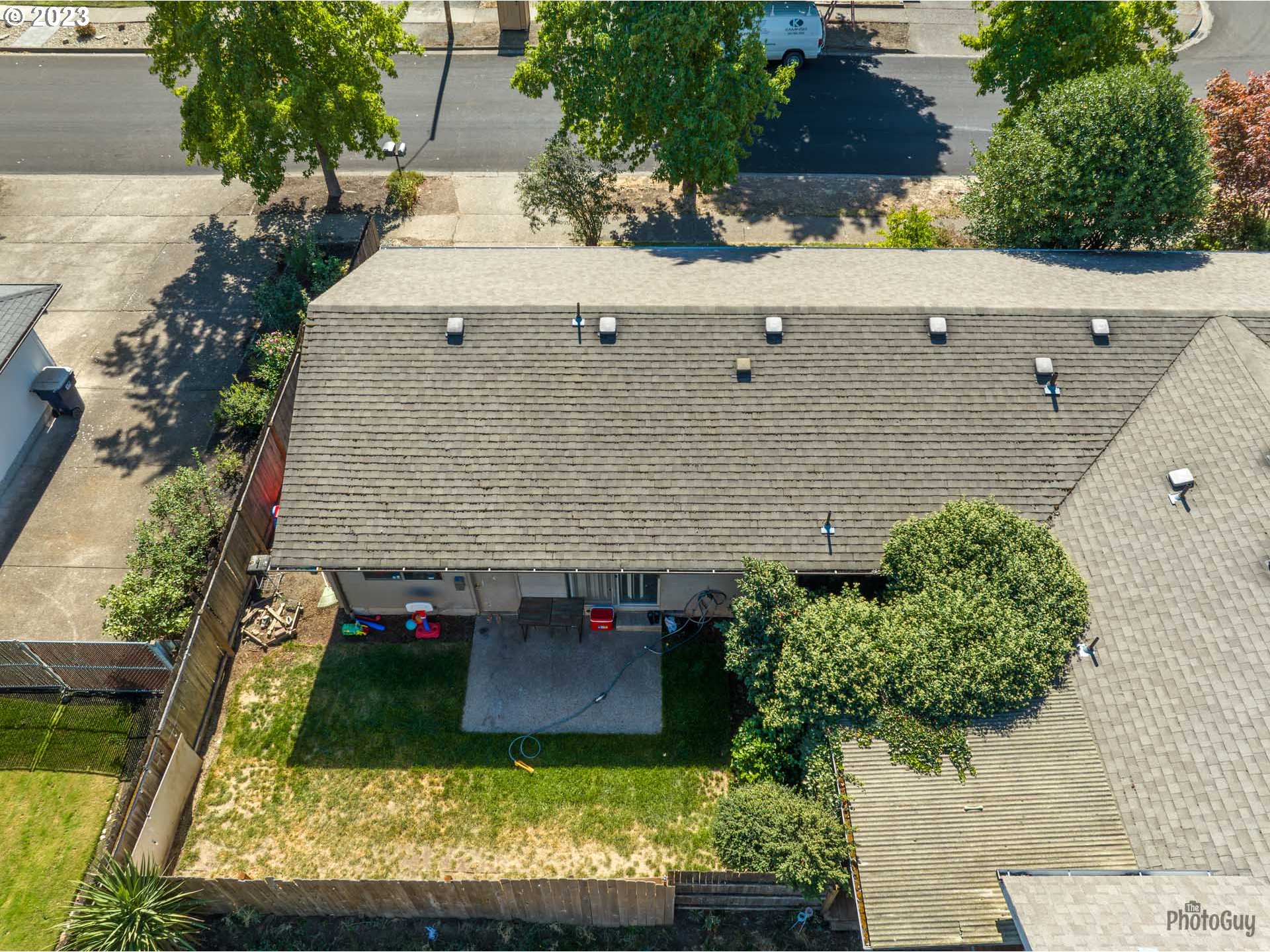 806 V Street Springfield, OR 97477 - Photo 6 of 14 an aerial view of a house with a yard