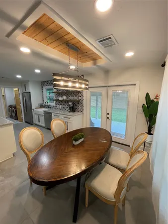 a room with furniture and a chandelier