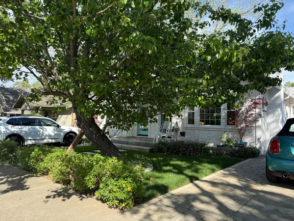 a view of backyard with wooden deck