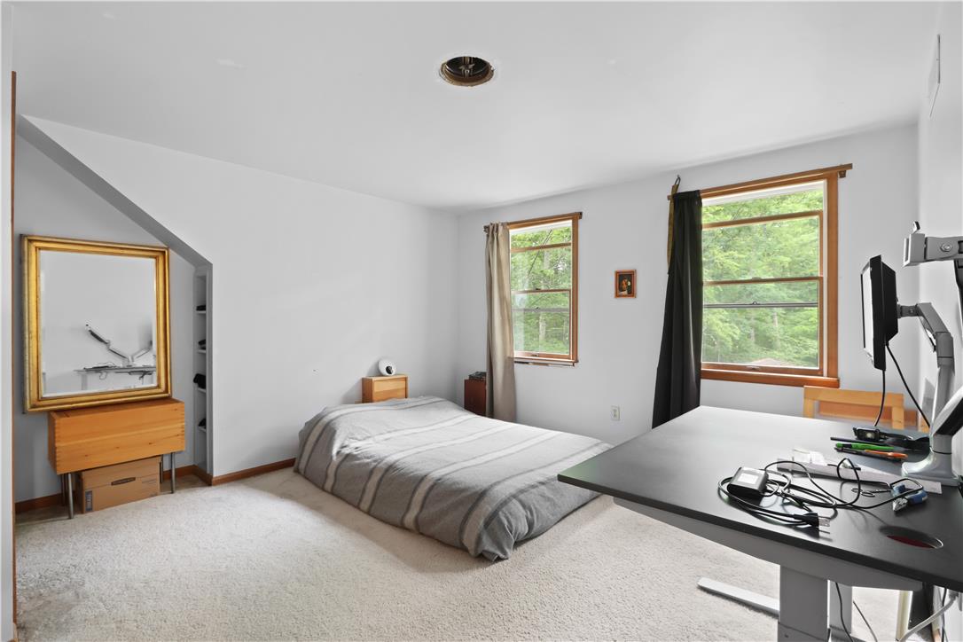 209 Remington Road East Stroudsburg, PA 18301 - Photo 28 of 41 A quiet retreat with plush carpeting and naturally illuminated spaces through large windows.