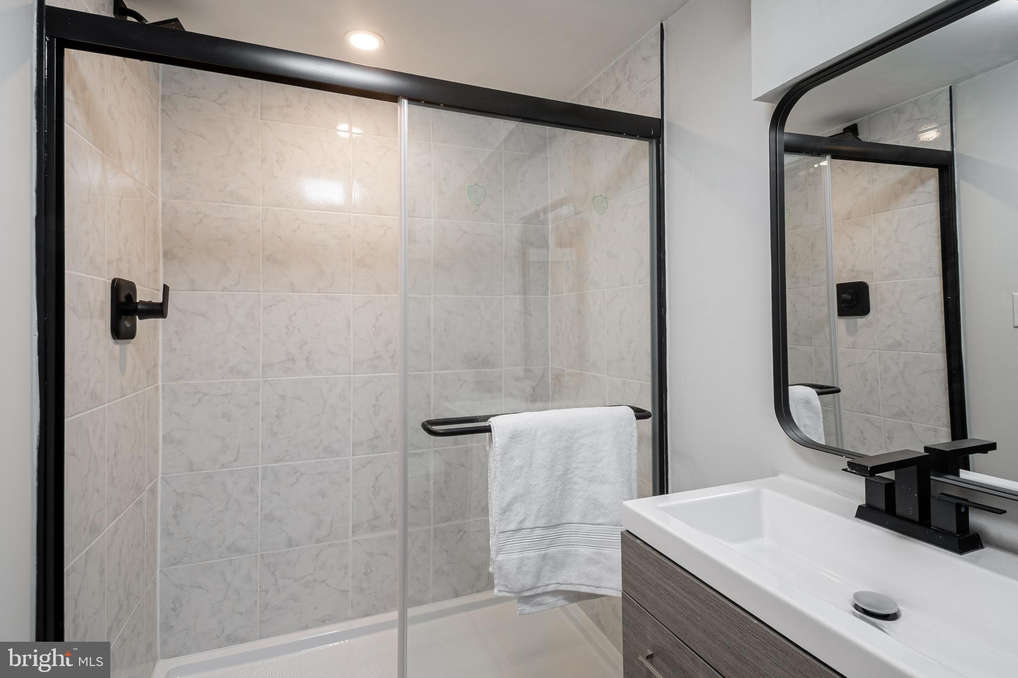 6138 Dunroming Road Baltimore, MD 21239 - Photo 21 of 25 Basement Bathroom- Full
