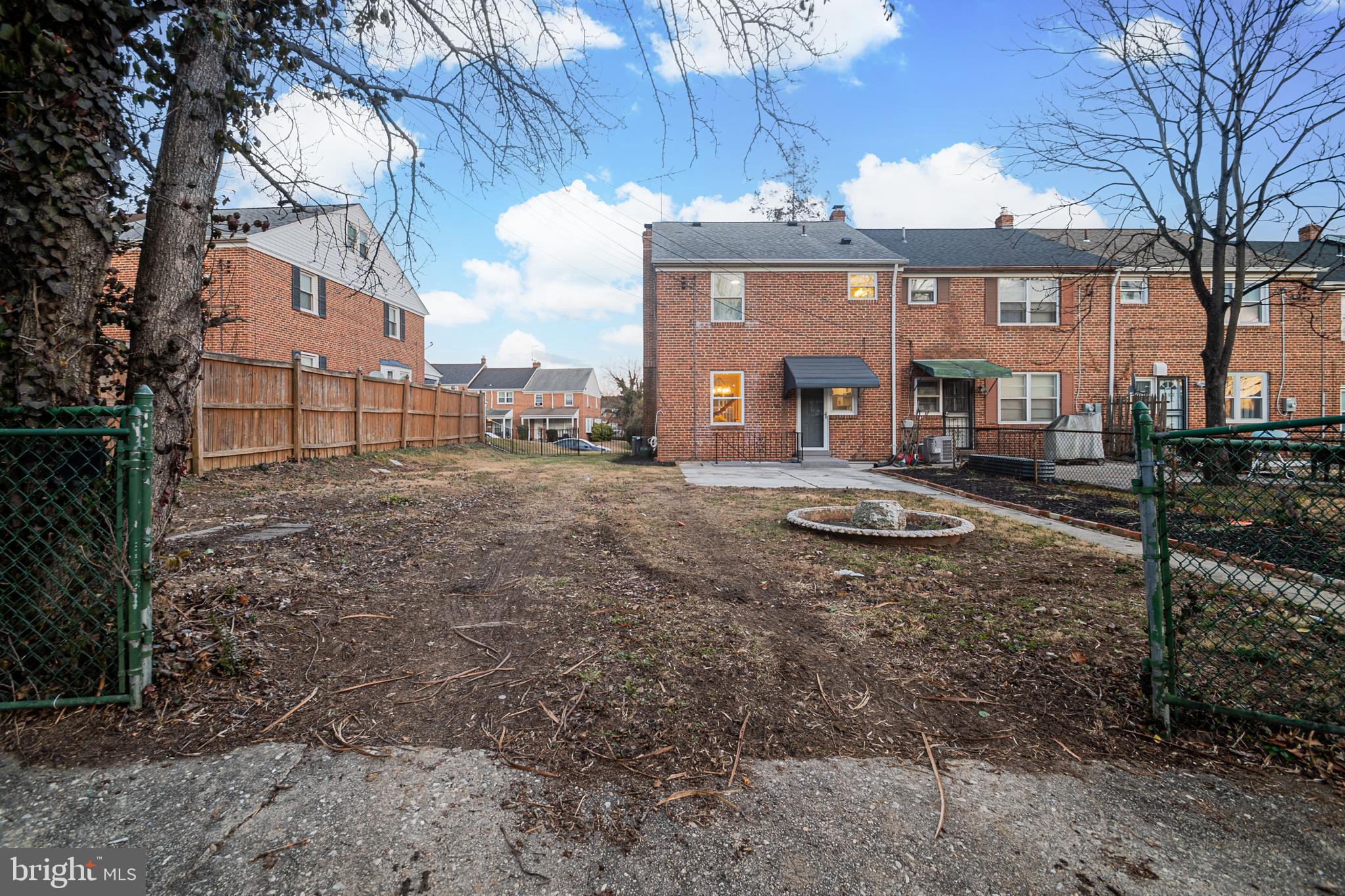 6138 Dunroming Road Baltimore, MD 21239 - Photo 25 of 25 Back yard- Also private parking spots behind this.