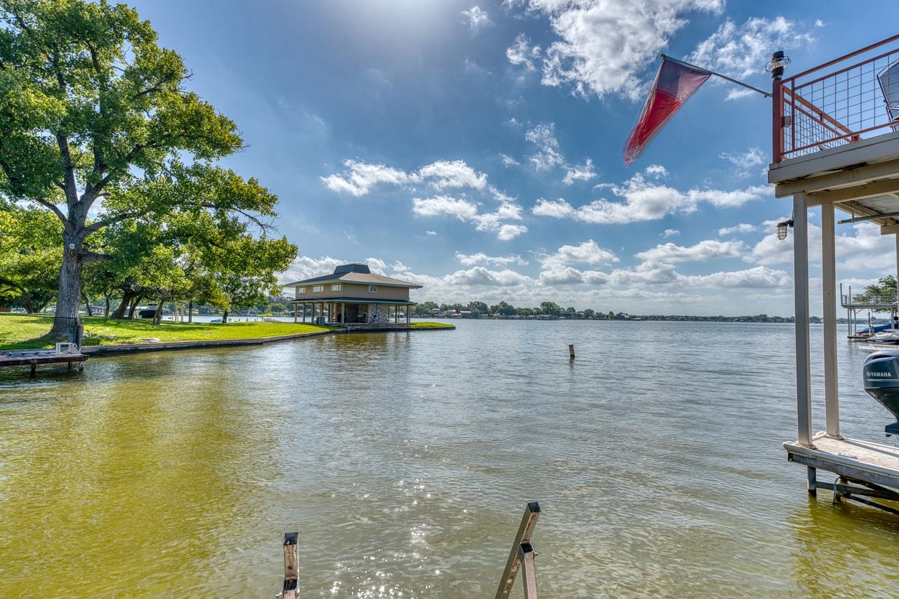 207 Princess Terrace Sunrise Beach, TX 78643 - Photo 21 of 25 a view of a lake with houses