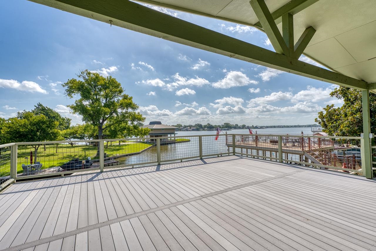 207 Princess Terrace Sunrise Beach, TX 78643 - Photo 23 of 25 a balcony with wooden floor