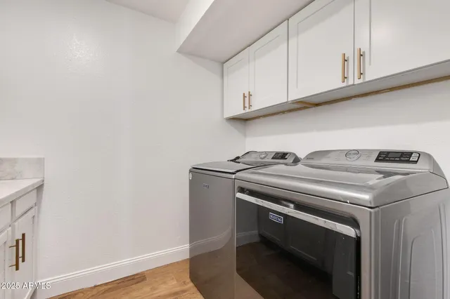an aerial view of a house with a lake view