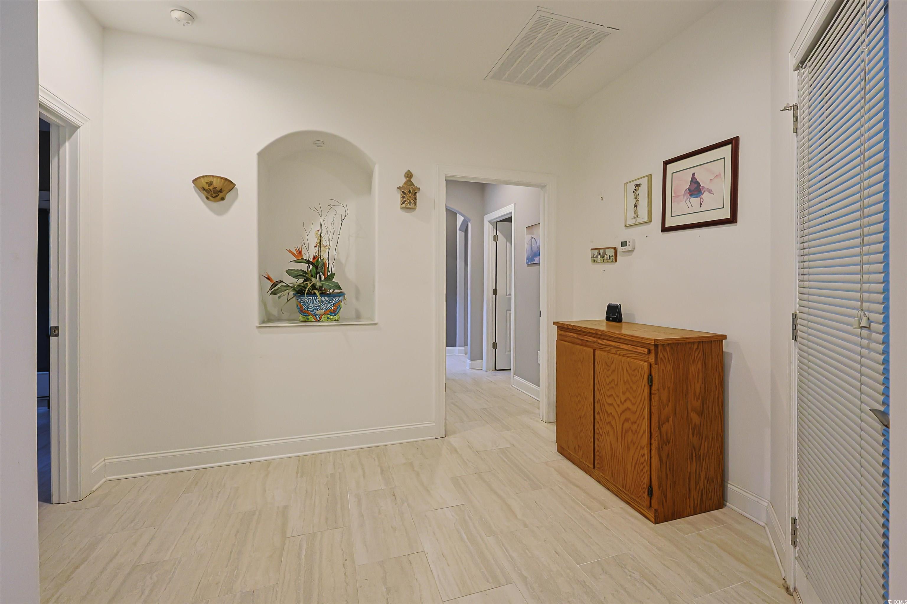 1065 Wigeon Drive Conway, SC 29526 - Photo 17 of 40 Hall featuring light wood finished floors and baseboards