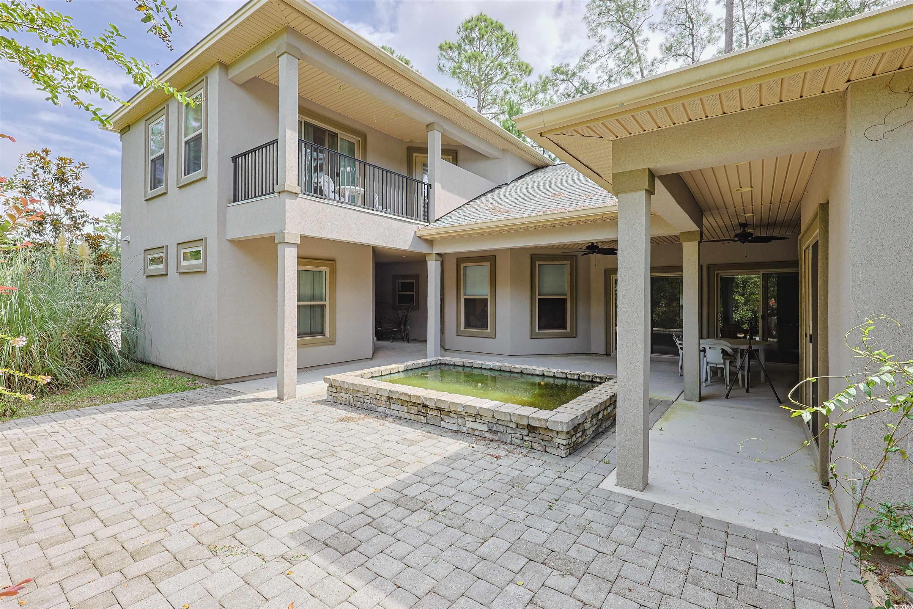 1065 Wigeon Drive Conway, SC 29526 - Photo 25 of 40 Back of house featuring stucco siding, a patio area, a balcony, and ceiling fan