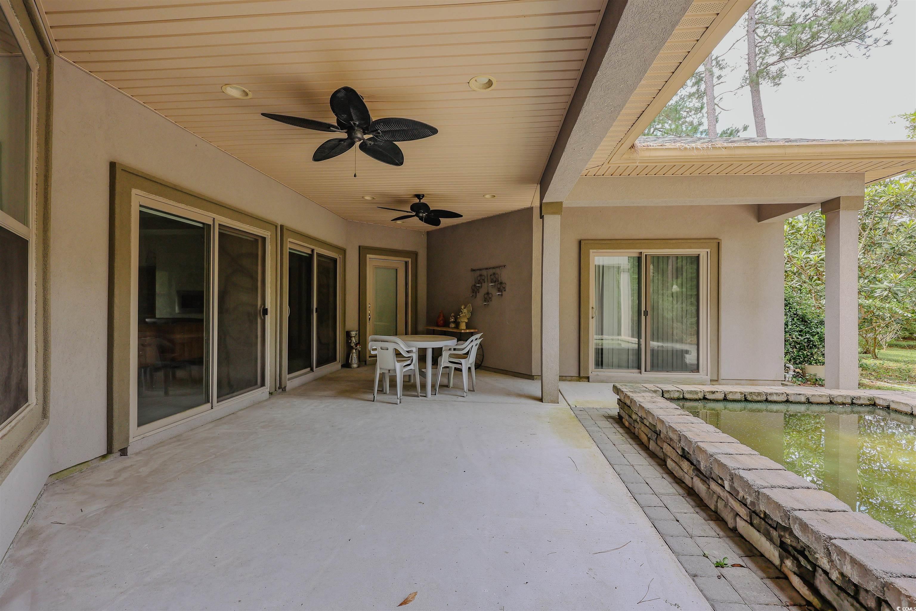 1065 Wigeon Drive Conway, SC 29526 - Photo 27 of 40 View of patio / terrace featuring outdoor dining area and ceiling fan