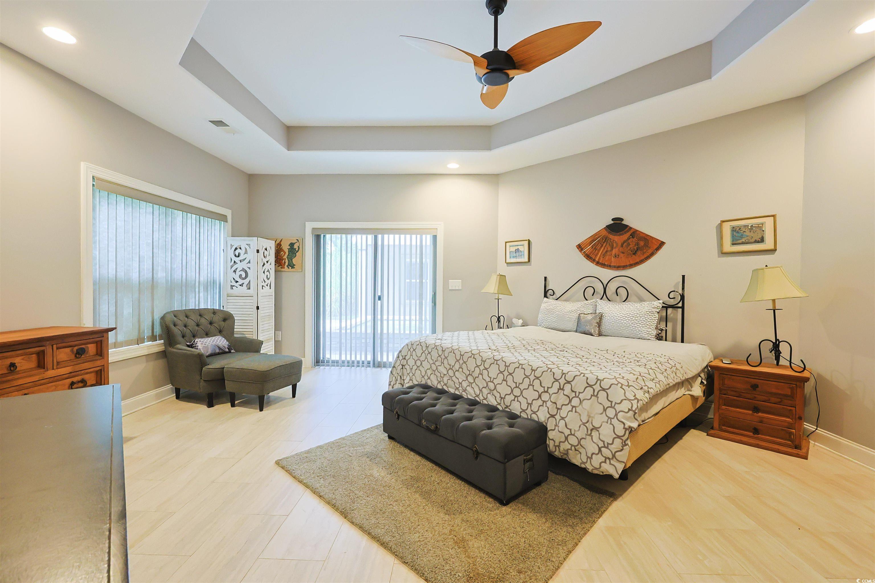 1065 Wigeon Drive Conway, SC 29526 - Photo 8 of 40 Bedroom with a raised ceiling, access to exterior, ceiling fan, and recessed lighting