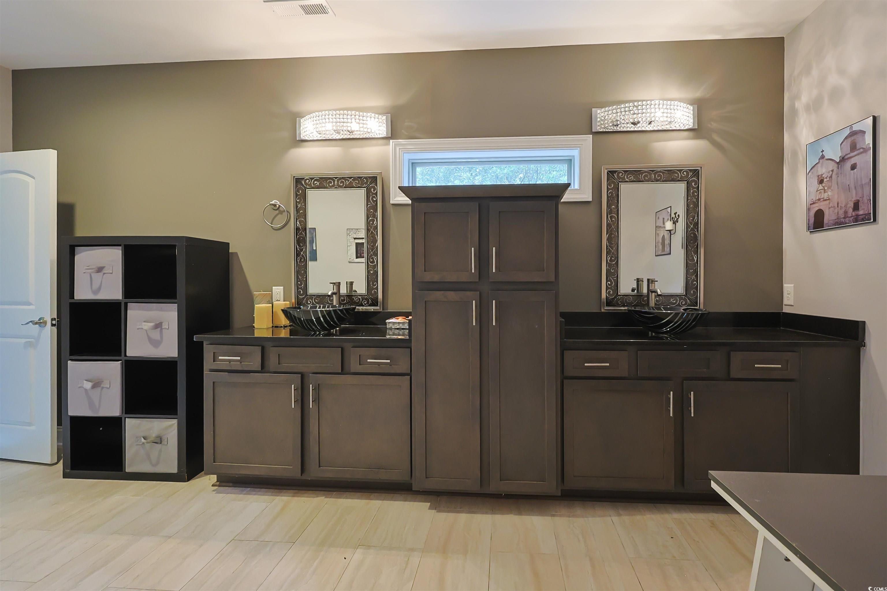 1065 Wigeon Drive Conway, SC 29526 - Photo 10 of 40 Kitchen featuring dark brown cabinets and dark countertops