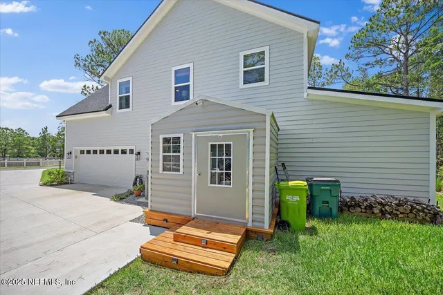 a backyard of a house with seating space