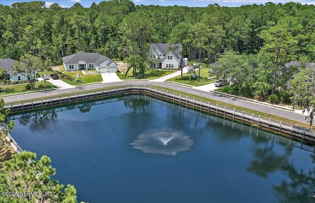 a view of swimming pool from a balcony