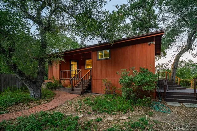 a backyard of a house with lots of green space