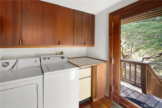 a bathroom with a toilet a sink and a window