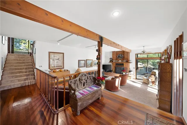 a view of a living room and dining room