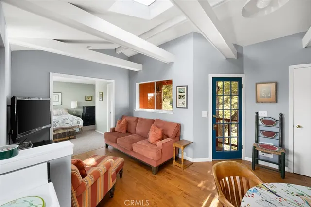 a view of a mountain range with trees in the background