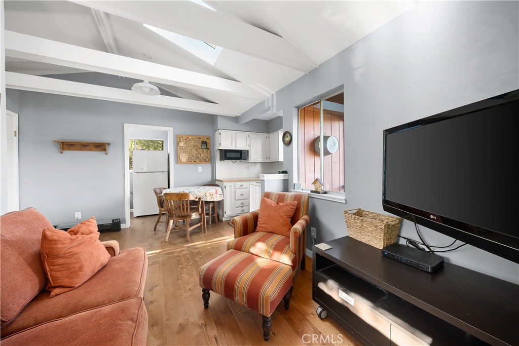 4411 See Canyon Road San Luis Obispo, CA 93405 - Photo 50 of 75 a living room with furniture and a flat screen tv