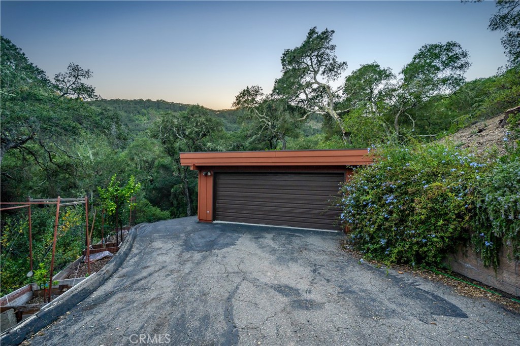 4411 See Canyon Road San Luis Obispo, CA 93405 - Photo 60 of 75 a house with trees in front of it