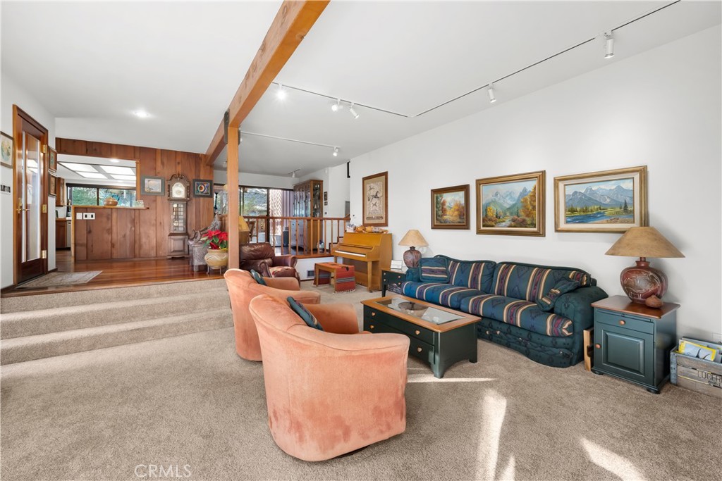 4411 See Canyon Road San Luis Obispo, CA 93405 - Photo 6 of 75 a living room with furniture and a large window