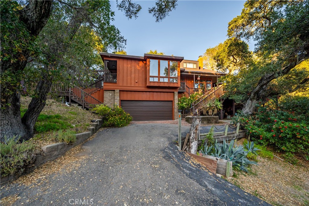 4411 See Canyon Road San Luis Obispo, CA 93405 - Photo 61 of 75 a front view of a house with garden