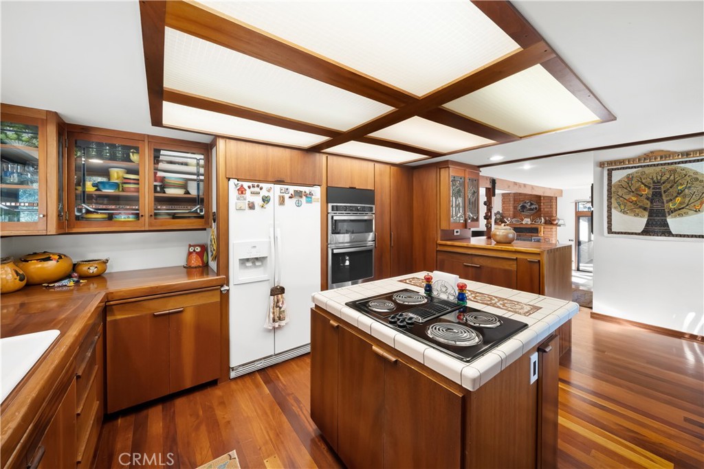 4411 See Canyon Road San Luis Obispo, CA 93405 - Photo 10 of 75 a kitchen with stainless steel appliances granite countertop a stove and a refrigerator