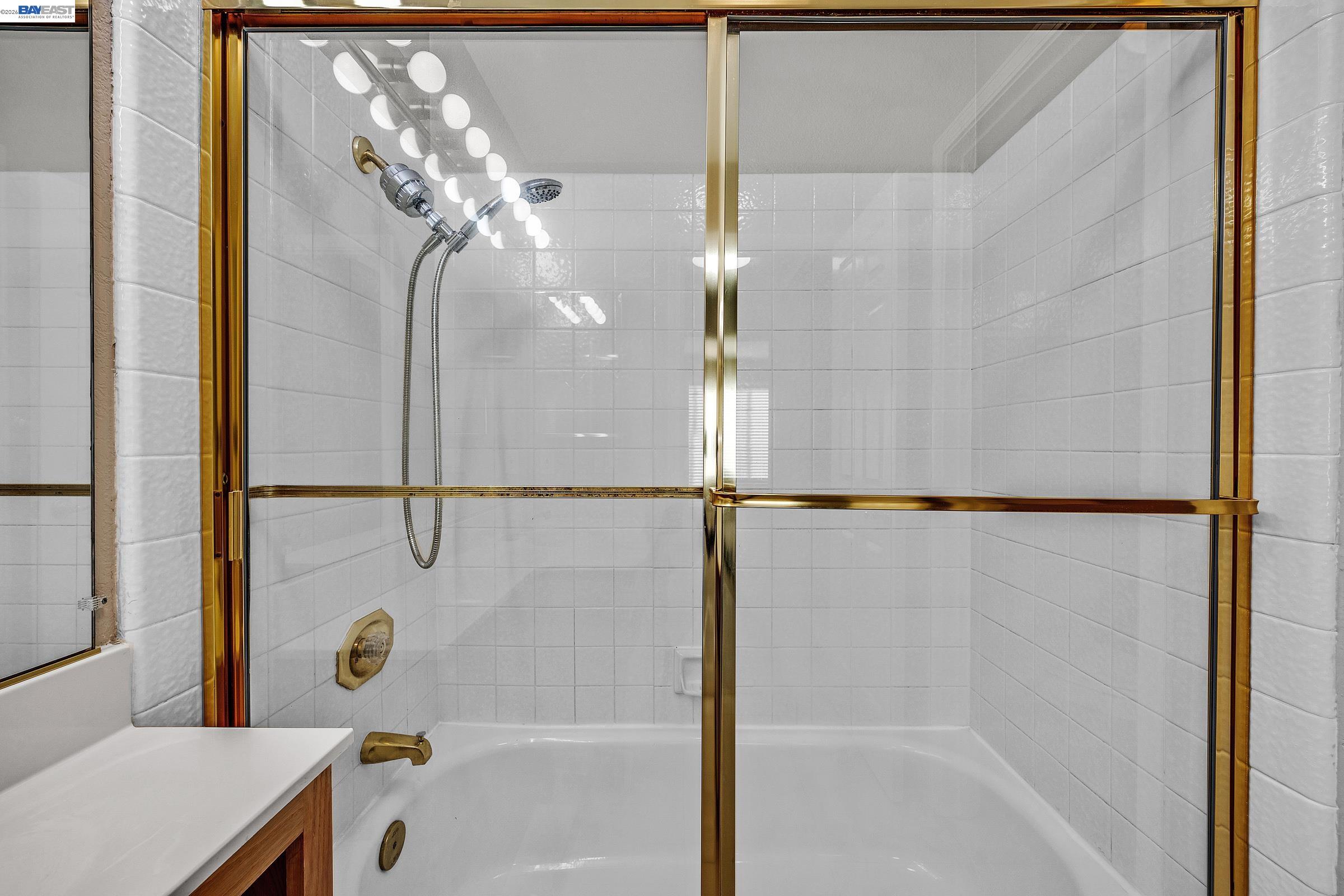 3769 Crow Canyon Road San Ramon, CA 94582 - Photo 30 of 56 a bathroom with a glass shower door