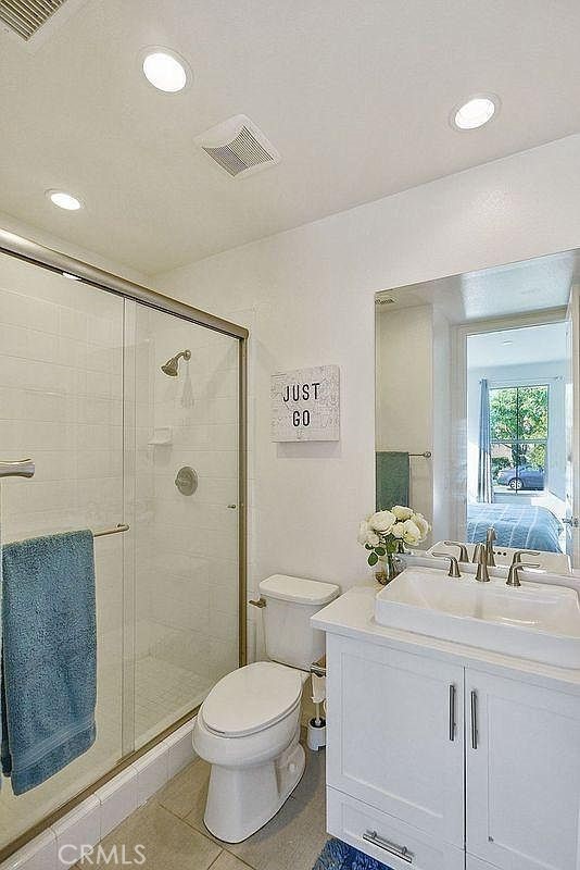 217 Compass Irvine, CA 92618 - Photo 20 of 34 a bathroom with a sink a toilet and shower
