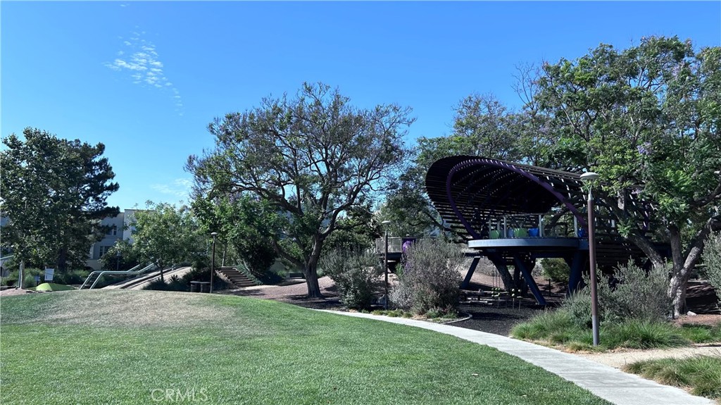 217 Compass Irvine, CA 92618 - Photo 29 of 34 a backyard of a house with table and chairs