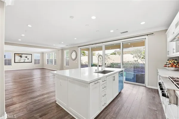 a view of room with window and ceiling fan