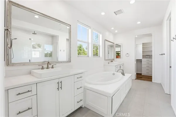 a bathroom with a sink a toilet and a bathtub
