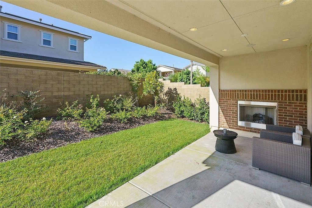 217 Compass Irvine, CA 92618 - Photo 8 of 34 a view of a patio with couches plants and large tree