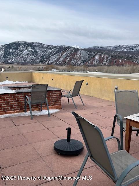 231 Robinson Street, Unit 338 Basalt, CO 81621 - Photo 16 of 17 a view of a chairs and table in the terrace