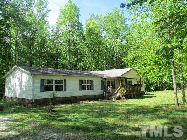 109 Medlin Road Rougemont, NC 27572 - Photo 1 of 19 a view of a house with a yard